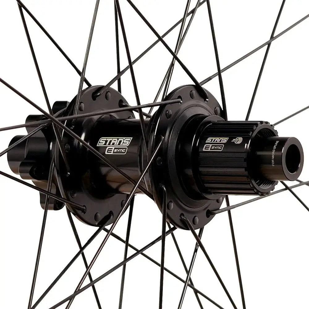 Stans Flow S2 6-Bolt rear wheel hub showcasing durable construction and advanced Bead Socket Technology for tubeless performance.